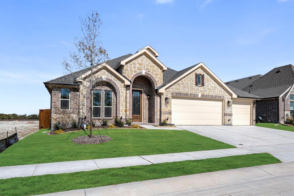 2016 Hickory Chase Lane Anna, TX 75409 - Photo 3 of 35 a view of a house with a yard