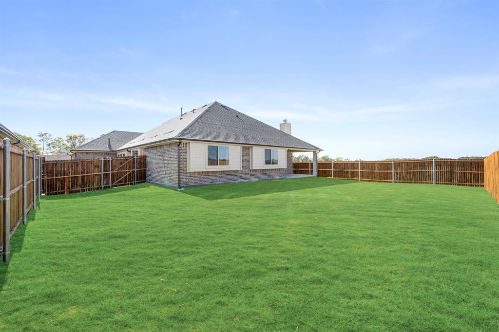 2016 Hickory Chase Lane Anna, TX 75409 - Photo 34 of 35 a view of a house with a backyard