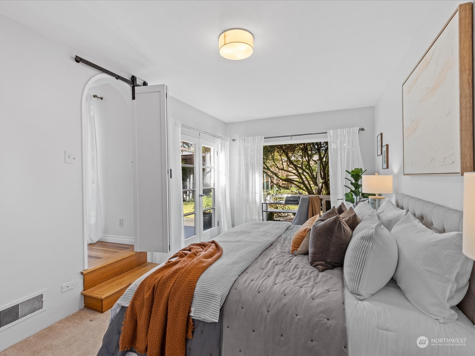 3735 Southwest 106th Street Seattle, WA 98146 - Photo 12 of 30 a bedroom with a bed and a window