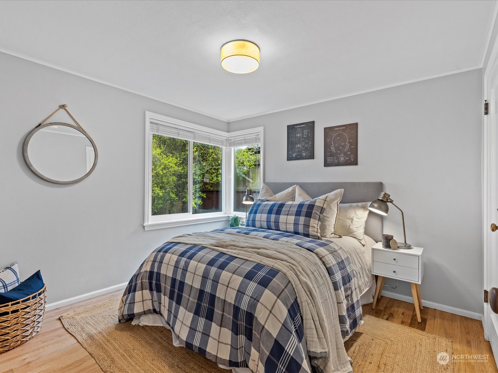 3735 Southwest 106th Street Seattle, WA 98146 - Photo 16 of 30 a bedroom with a bed and a window