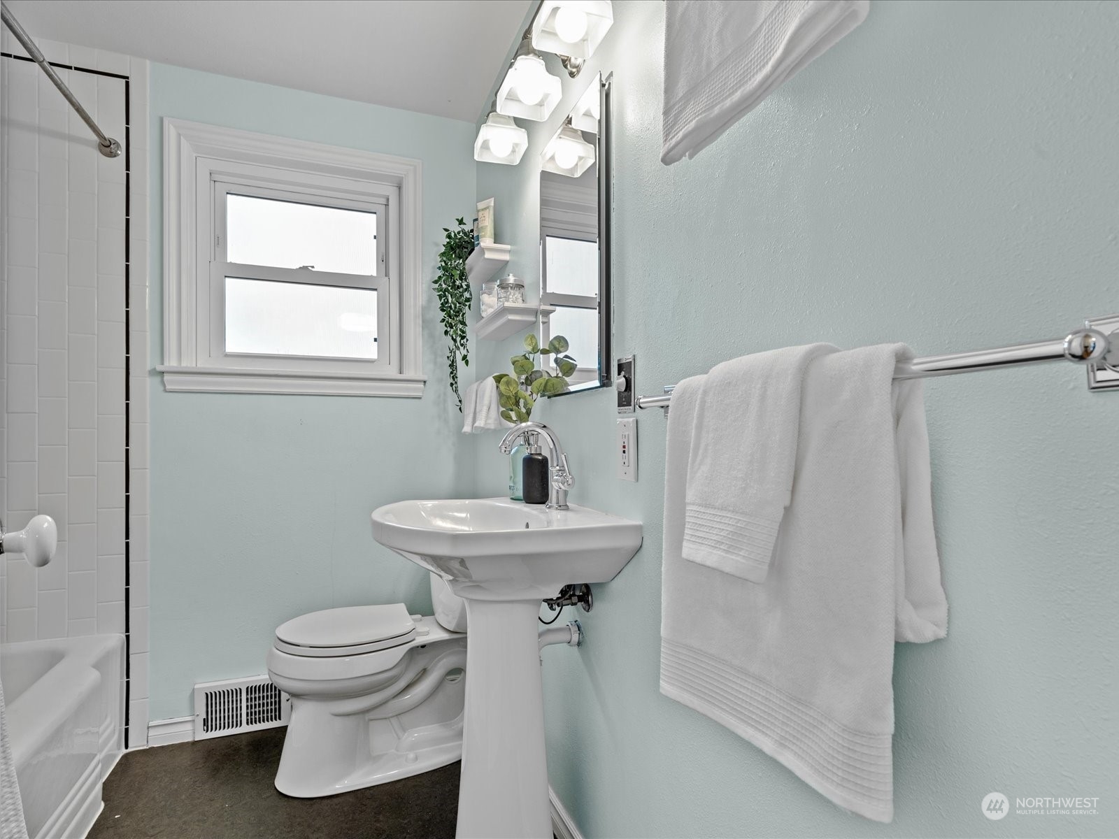 3735 Southwest 106th Street Seattle, WA 98146 - Photo 17 of 30 a bathroom with a sink toilet and shower