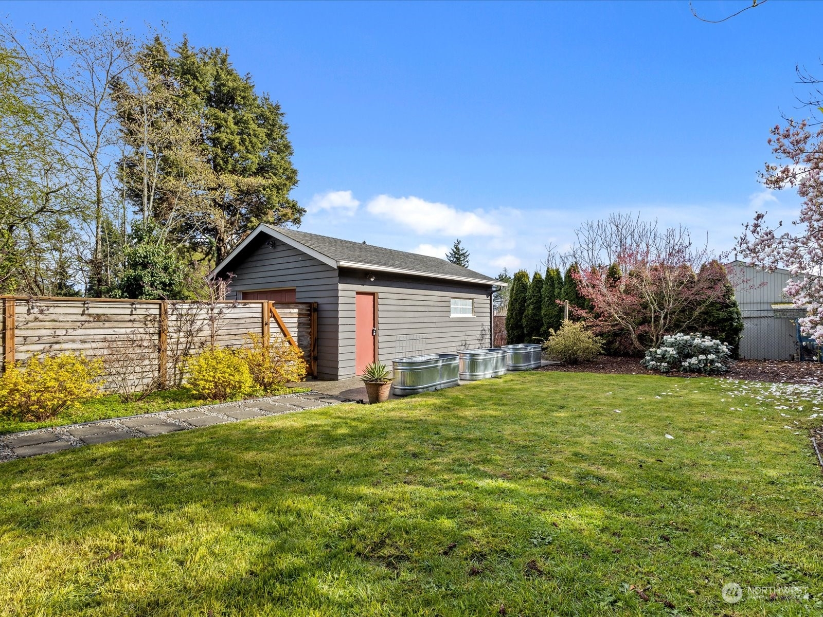 3735 Southwest 106th Street Seattle, WA 98146 - Photo 27 of 30 a front view of house with yard and green space