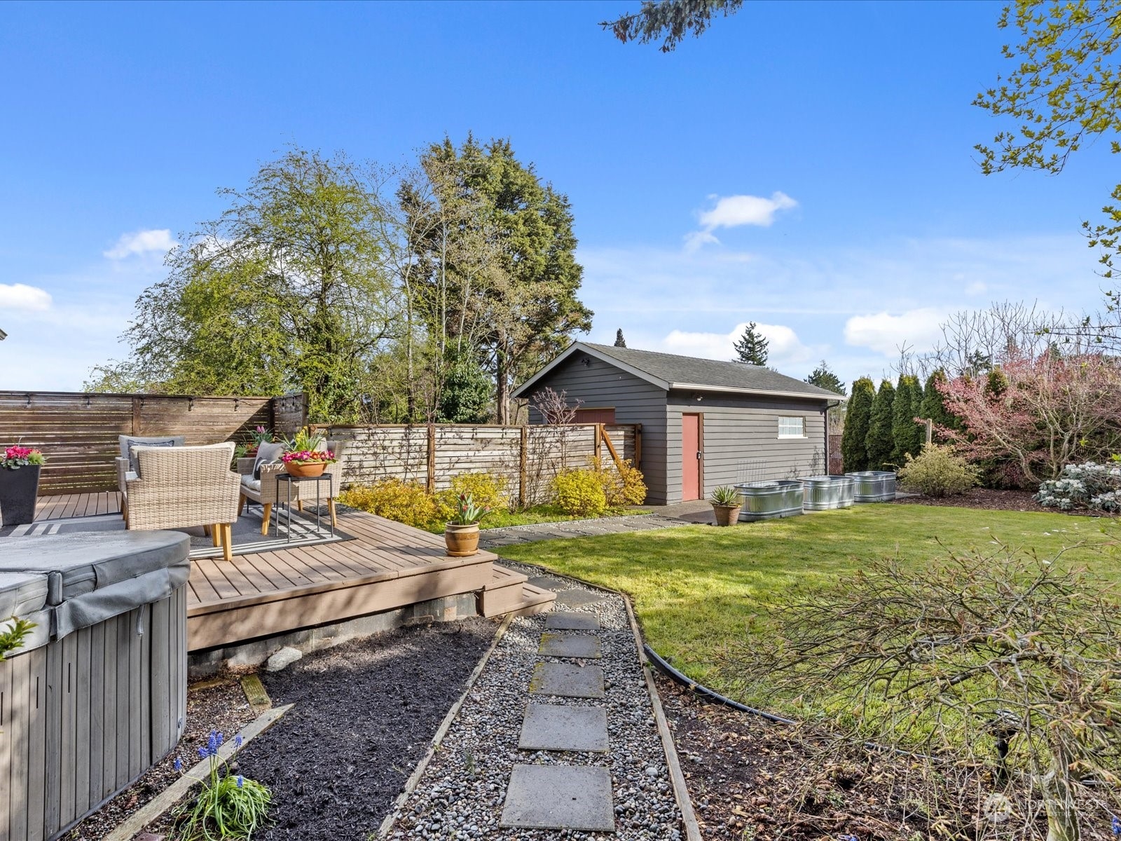 3735 Southwest 106th Street Seattle, WA 98146 - Photo 28 of 30 a view of a house with backyard and sitting area
