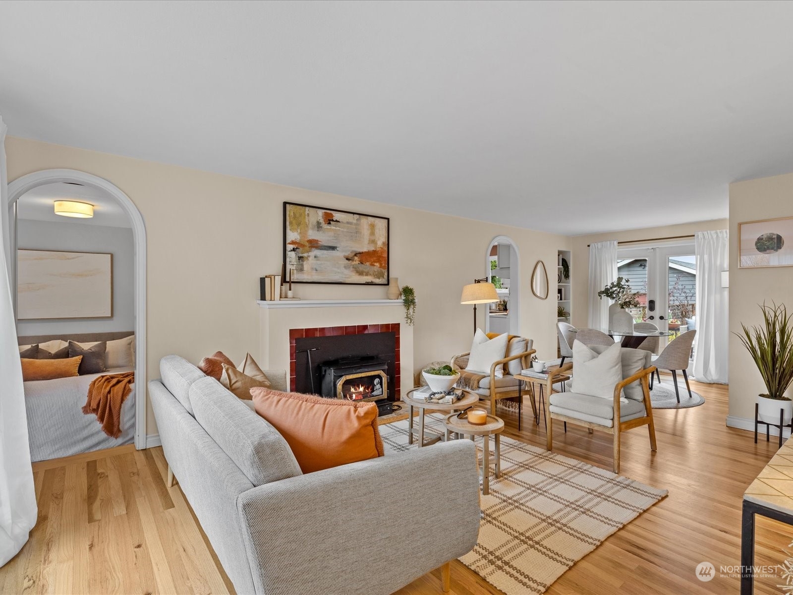 3735 Southwest 106th Street Seattle, WA 98146 - Photo 3 of 30 a living room with furniture and a fireplace
