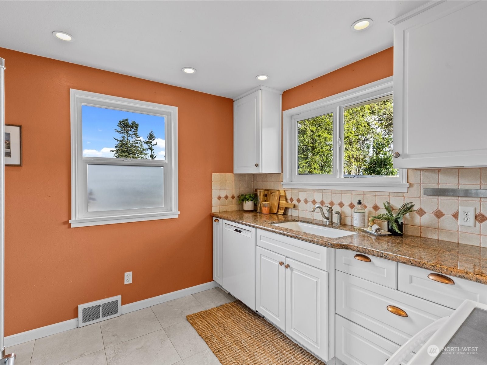 3735 Southwest 106th Street Seattle, WA 98146 - Photo 8 of 30 a kitchen with a sink cabinets and window