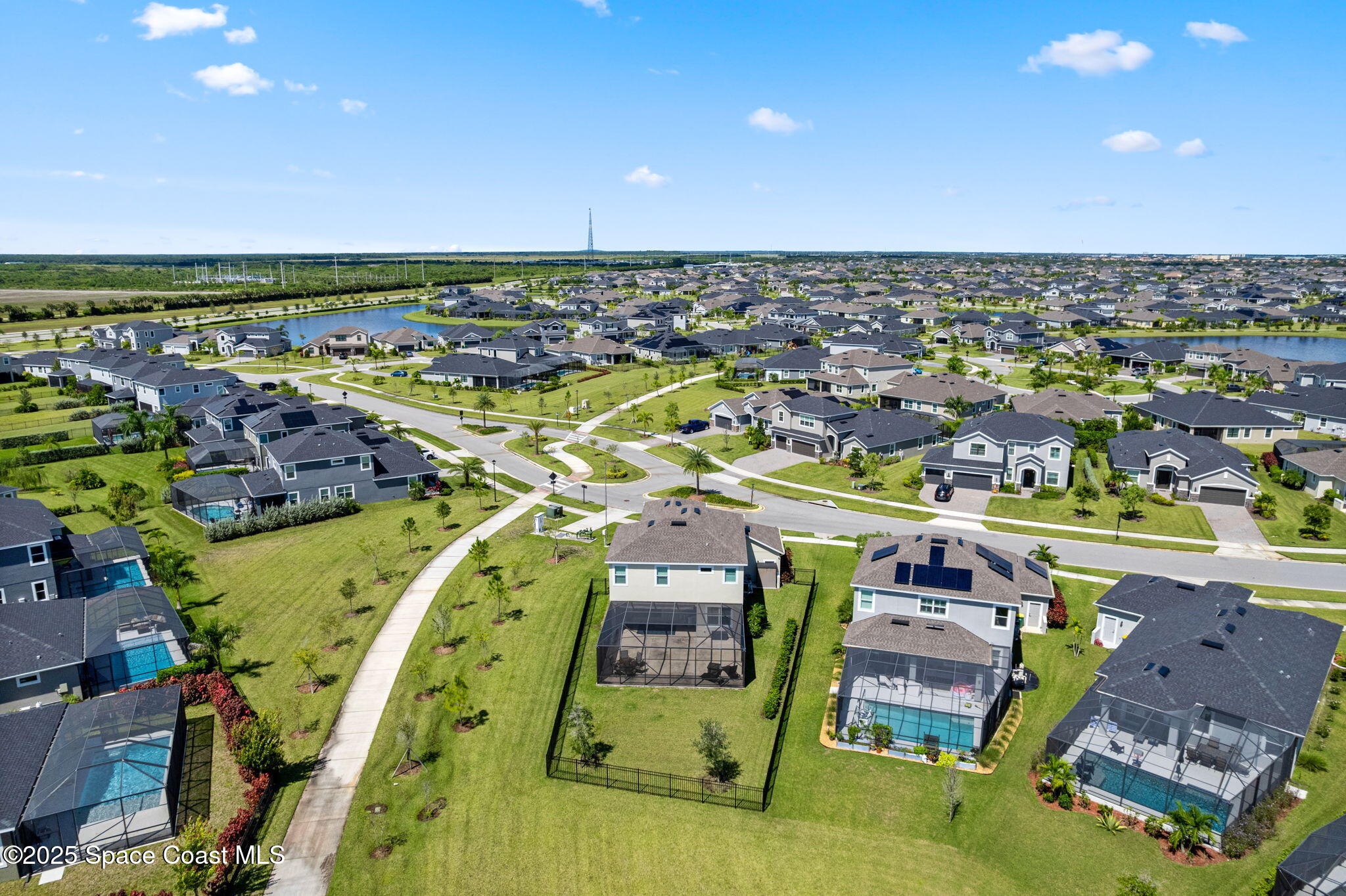 8215 Millbrook Avenue Melbourne, FL 32940 - Photo 43 of 62 an aerial view of tennis court