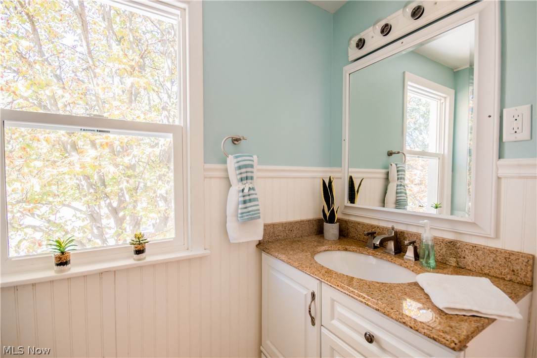 1609 Fairfax Road Akron, OH 44313 - Photo 27 of 35 A large, private window right by the sink to look out of while getting ready for the day.