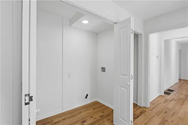 a view of a porch with wooden floor and outdoor space