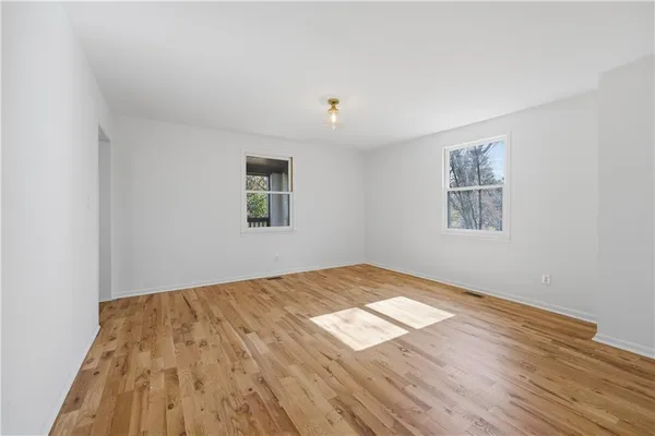 an aerial view of house with yard and mountain view