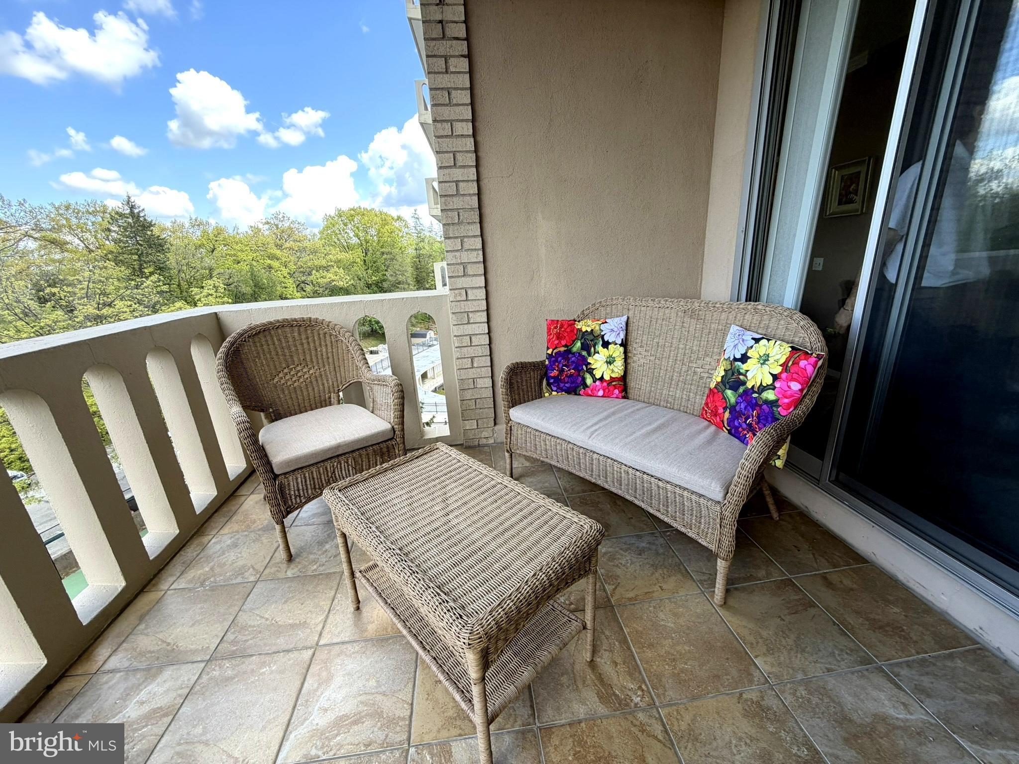 191 Presidential Boulevard, Unit R403 Bala Cynwyd, PA 19004 - Photo 12 of 30 a outdoor living space with furniture and garden view