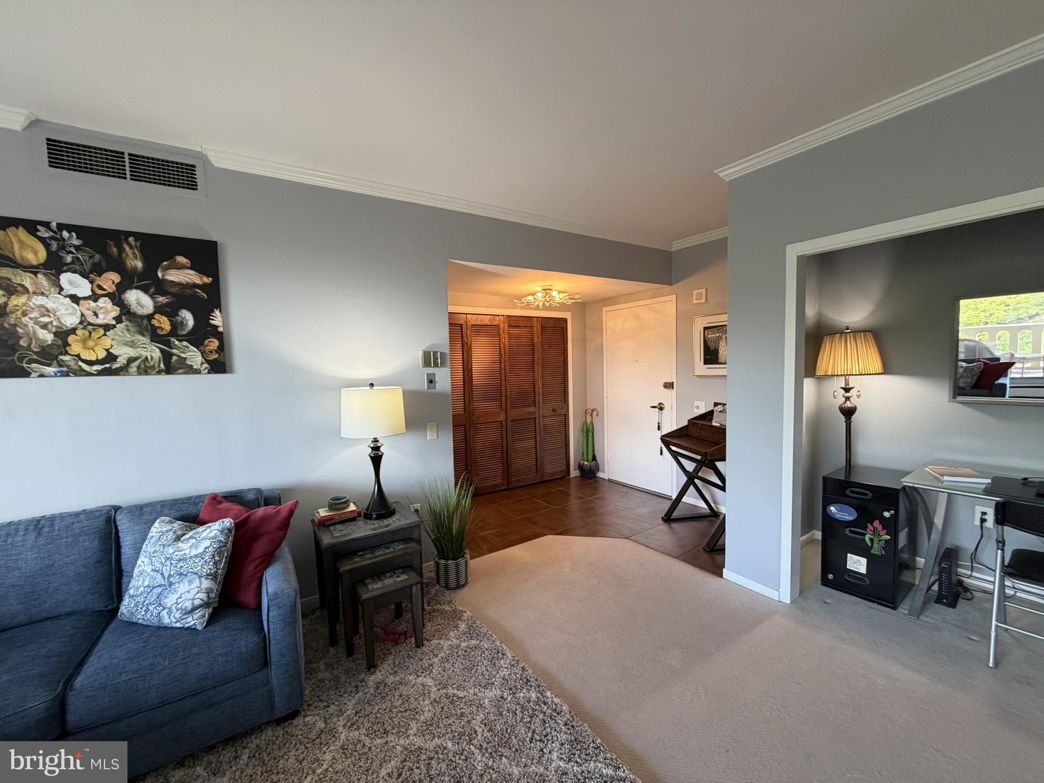 191 Presidential Boulevard, Unit R403 Bala Cynwyd, PA 19004 - Photo 19 of 30 a living room with furniture and a couch