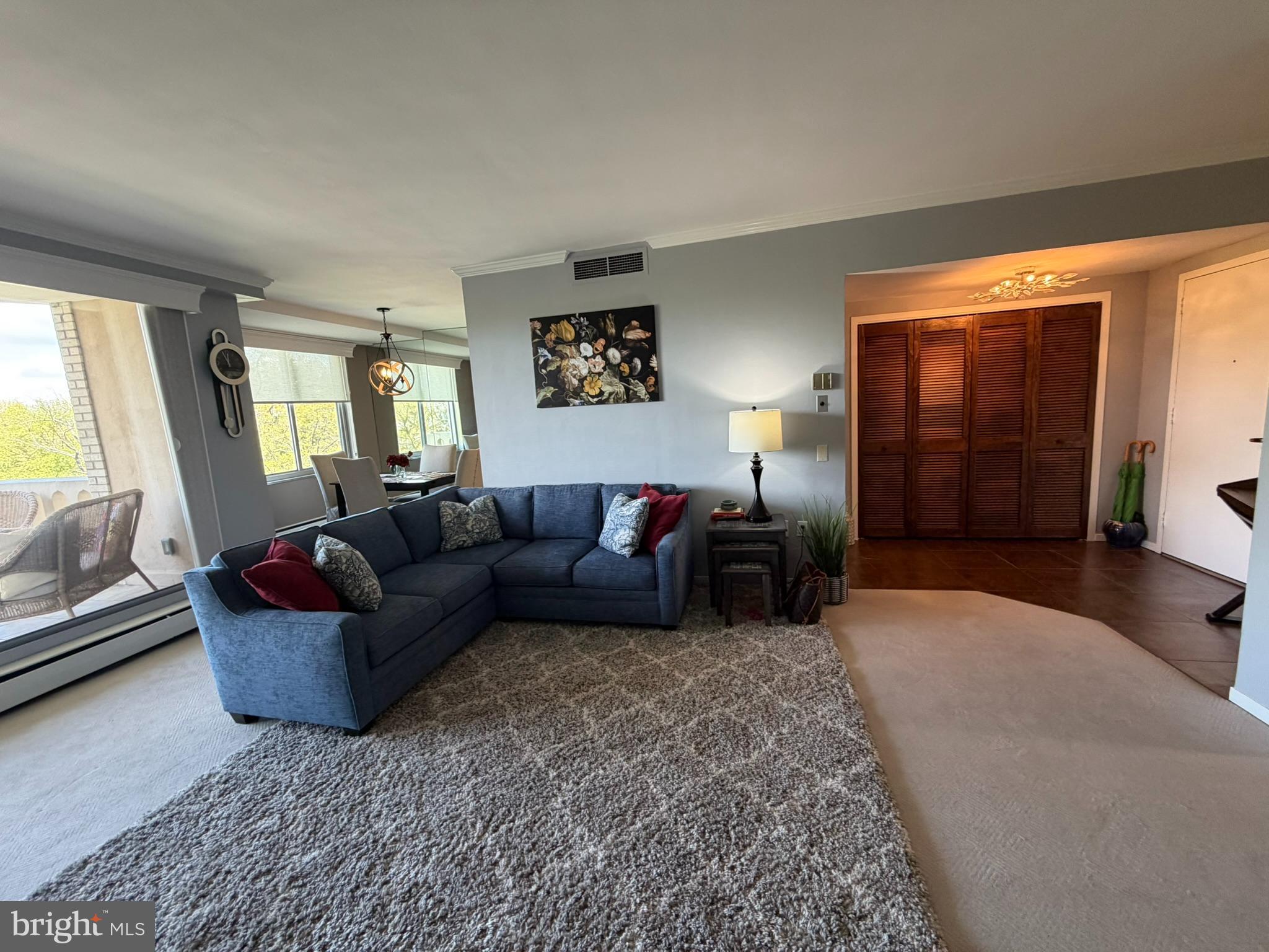 191 Presidential Boulevard, Unit R403 Bala Cynwyd, PA 19004 - Photo 20 of 30 a living room with furniture and a window
