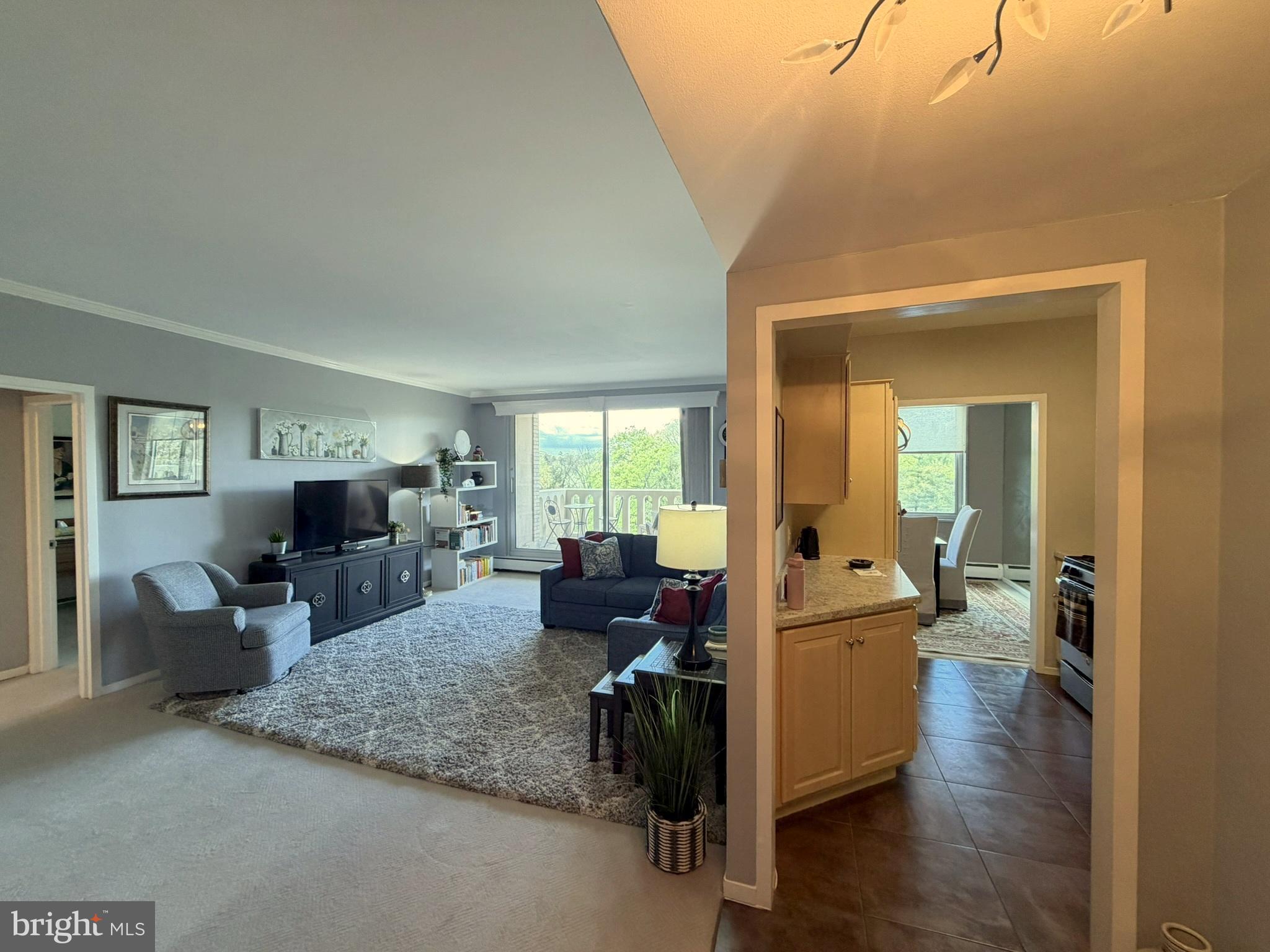 191 Presidential Boulevard, Unit R403 Bala Cynwyd, PA 19004 - Photo 7 of 30 a living room with furniture and a wooden floor