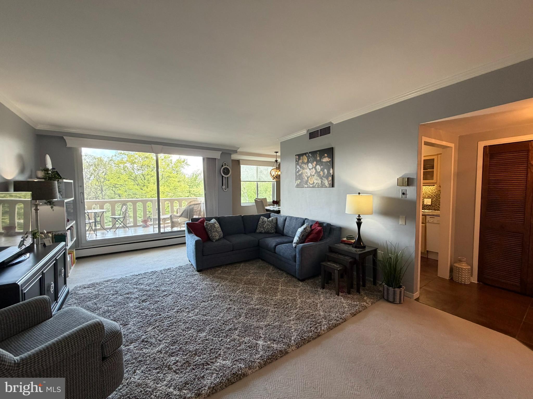 191 Presidential Boulevard, Unit R403 Bala Cynwyd, PA 19004 - Photo 10 of 30 a living room with furniture and a window