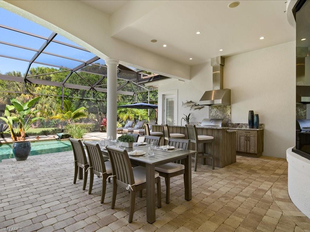 4249 Deephaven Lane Naples, FL 34119 - Photo 14 of 50 a view of a dining room with furniture window and outside view