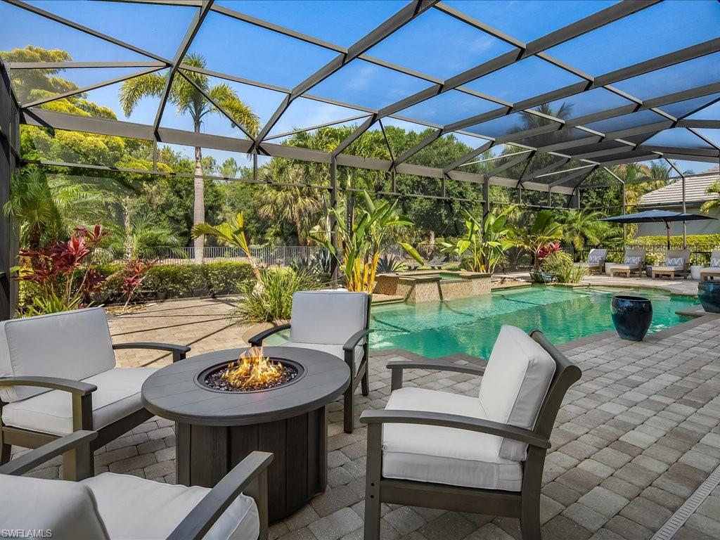 4249 Deephaven Lane Naples, FL 34119 - Photo 20 of 50 a view of an outdoor sitting area with furniture