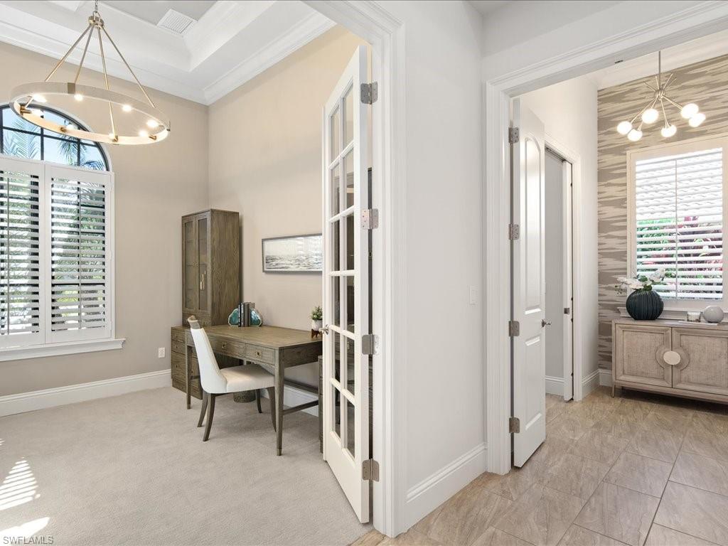 4249 Deephaven Lane Naples, FL 34119 - Photo 29 of 50 a view of a livingroom with furniture and windows