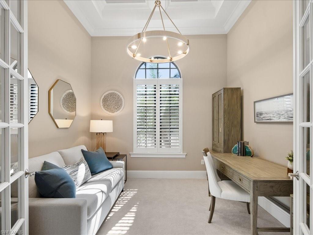 4249 Deephaven Lane Naples, FL 34119 - Photo 30 of 50 a view of a livingroom with furniture and a large window