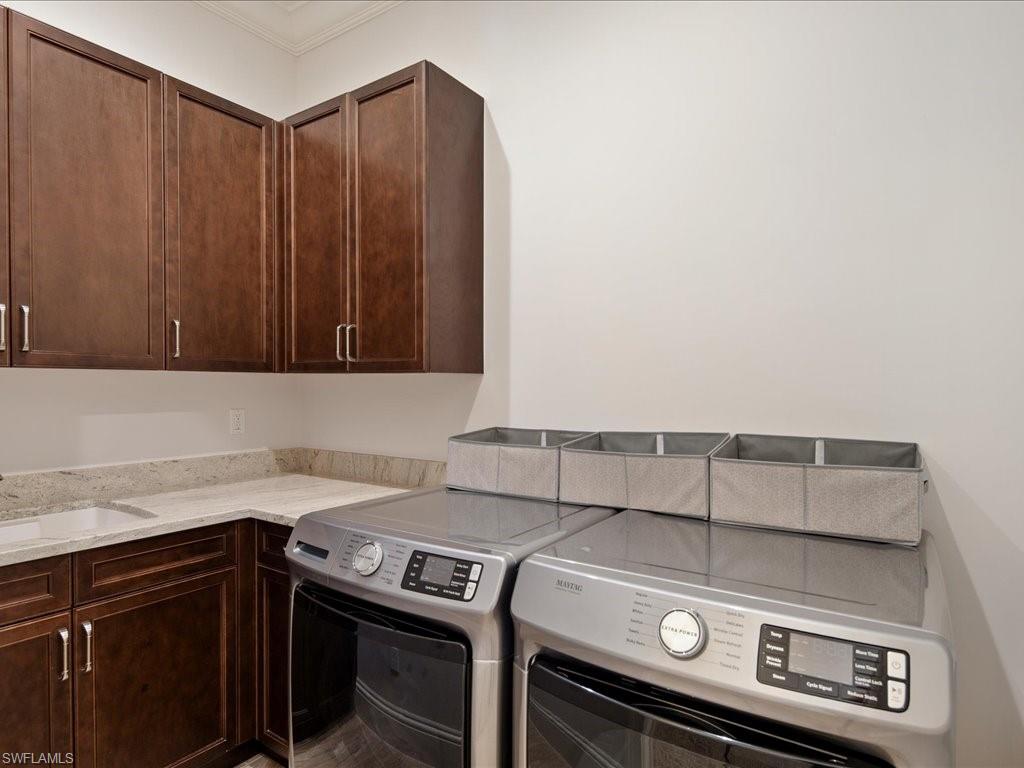 4249 Deephaven Lane Naples, FL 34119 - Photo 46 of 50 a view of washer and dryer
