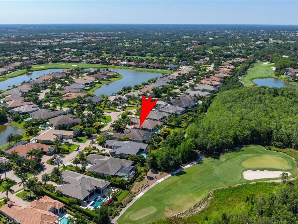 4249 Deephaven Lane Naples, FL 34119 - Photo 50 of 50 an aerial view of residential houses with outdoor space and swimming pool