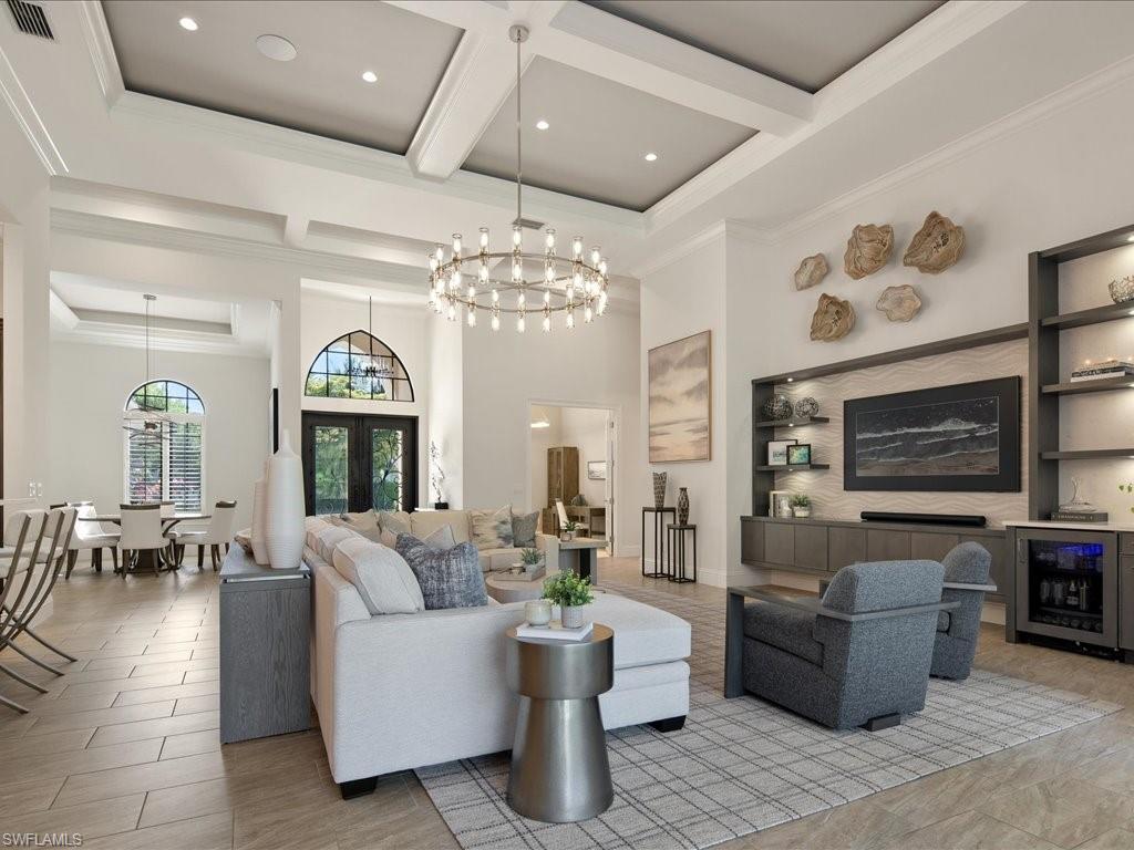 4249 Deephaven Lane Naples, FL 34119 - Photo 6 of 50 a living room with furniture and a fireplace