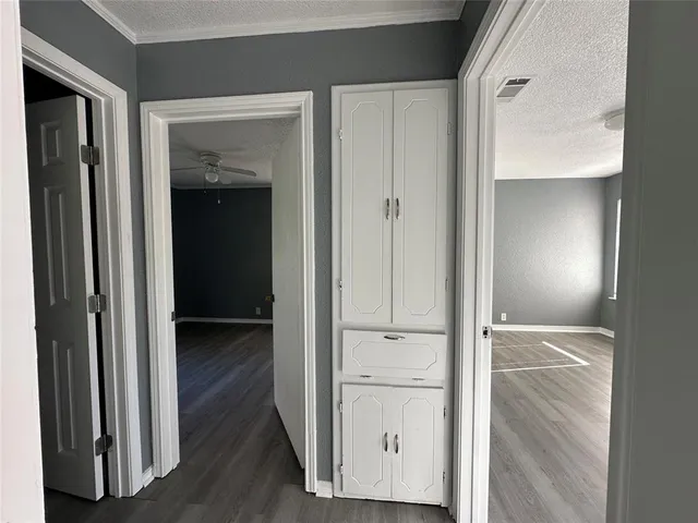 a view of a livingroom with furniture and a window