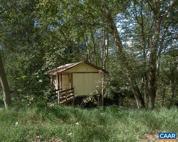 a view of an ocean and a mountain