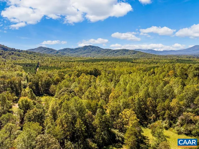 a view of a mountain from a yard