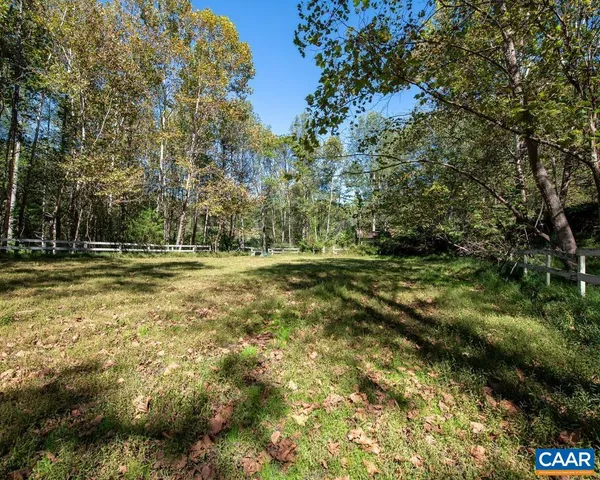 a view of backyard with green space