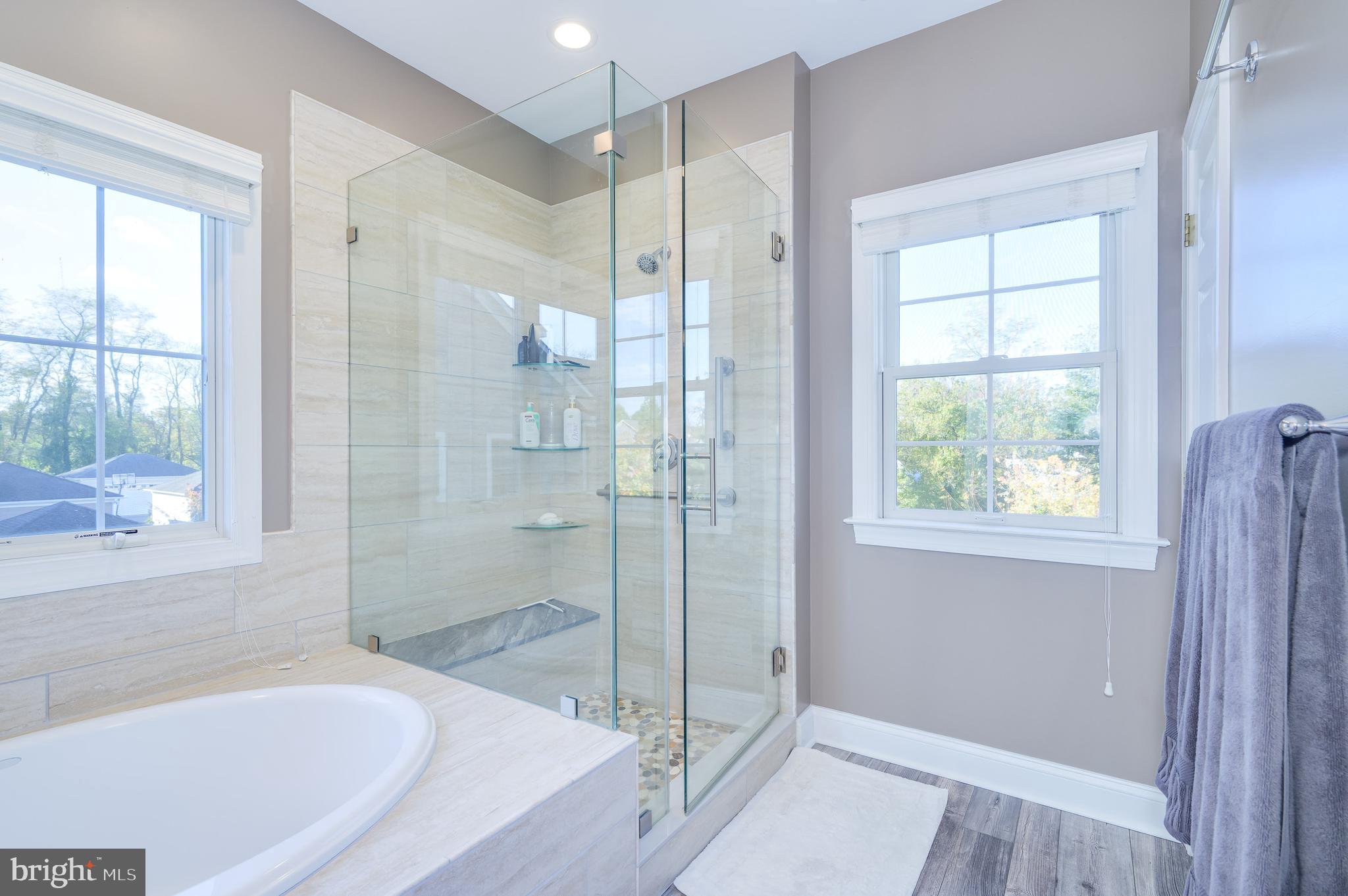 109 Amalfi Court Purcellville, VA 20132 - Photo 31 of 65 a bathroom with a bathtub and a shower