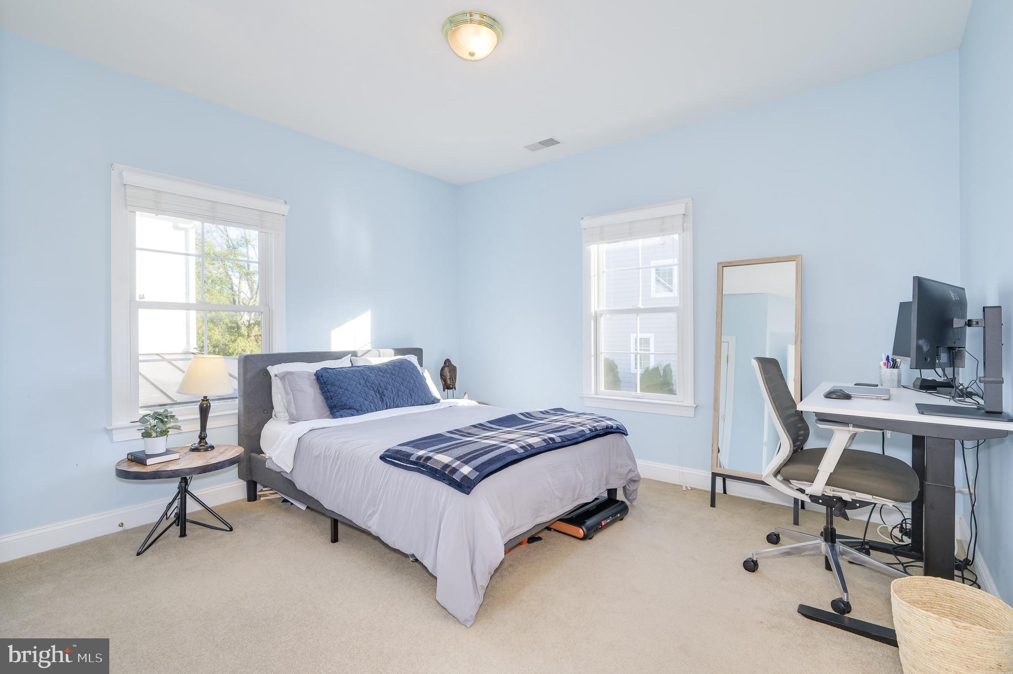 109 Amalfi Court Purcellville, VA 20132 - Photo 33 of 65 a bedroom with a bed a table and a window