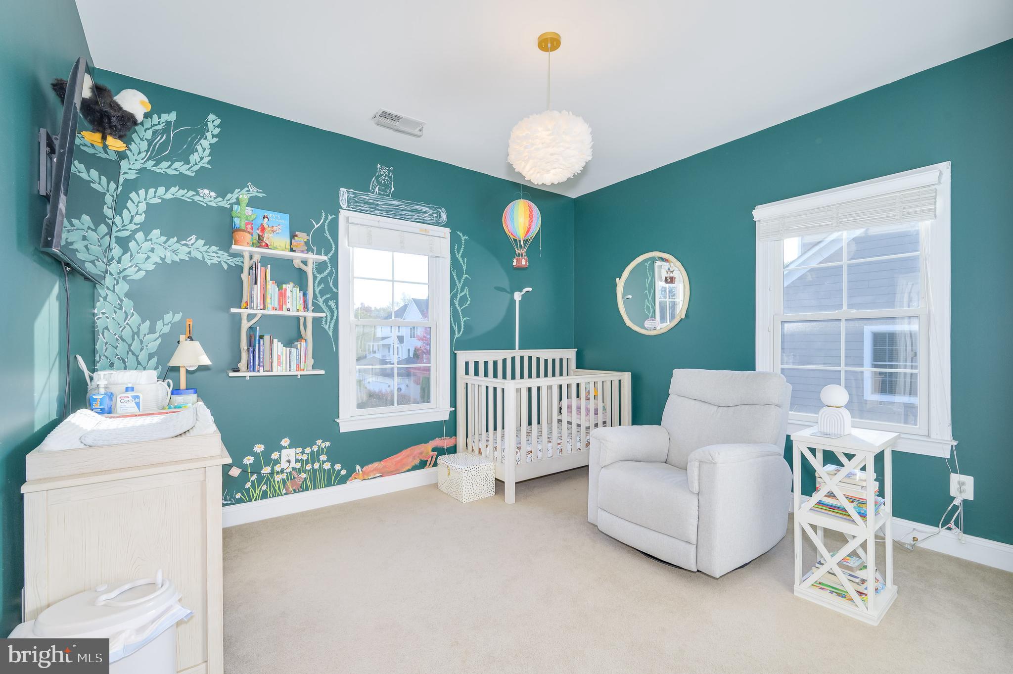 109 Amalfi Court Purcellville, VA 20132 - Photo 43 of 65 a living room with furniture and a floor to ceiling window