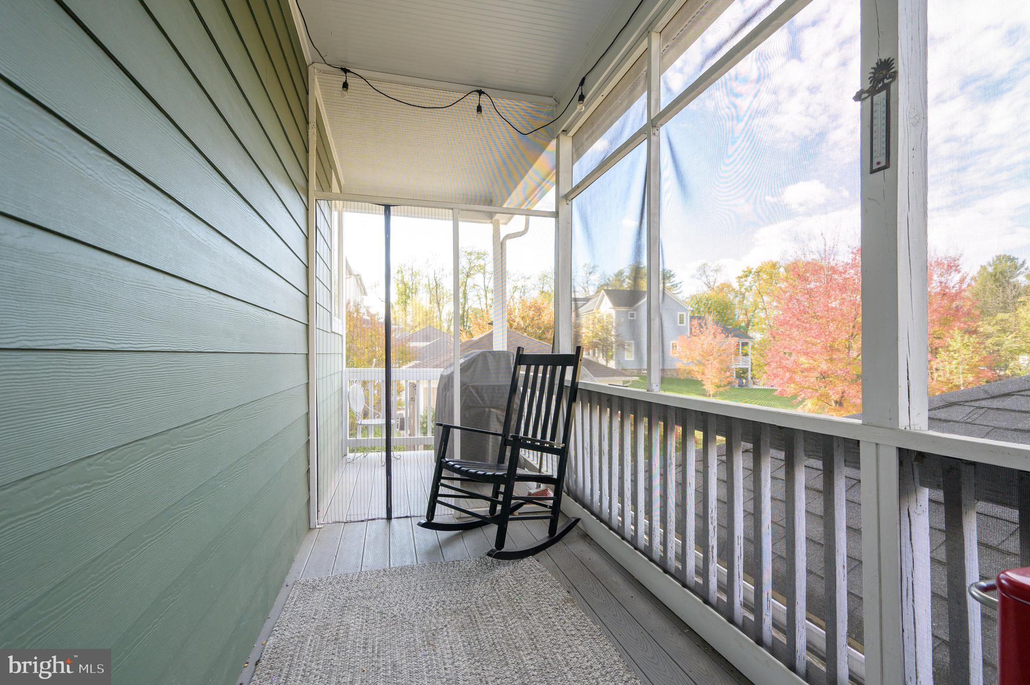 109 Amalfi Court Purcellville, VA 20132 - Photo 46 of 65 a view of outdoor room with wooden floor and furniture