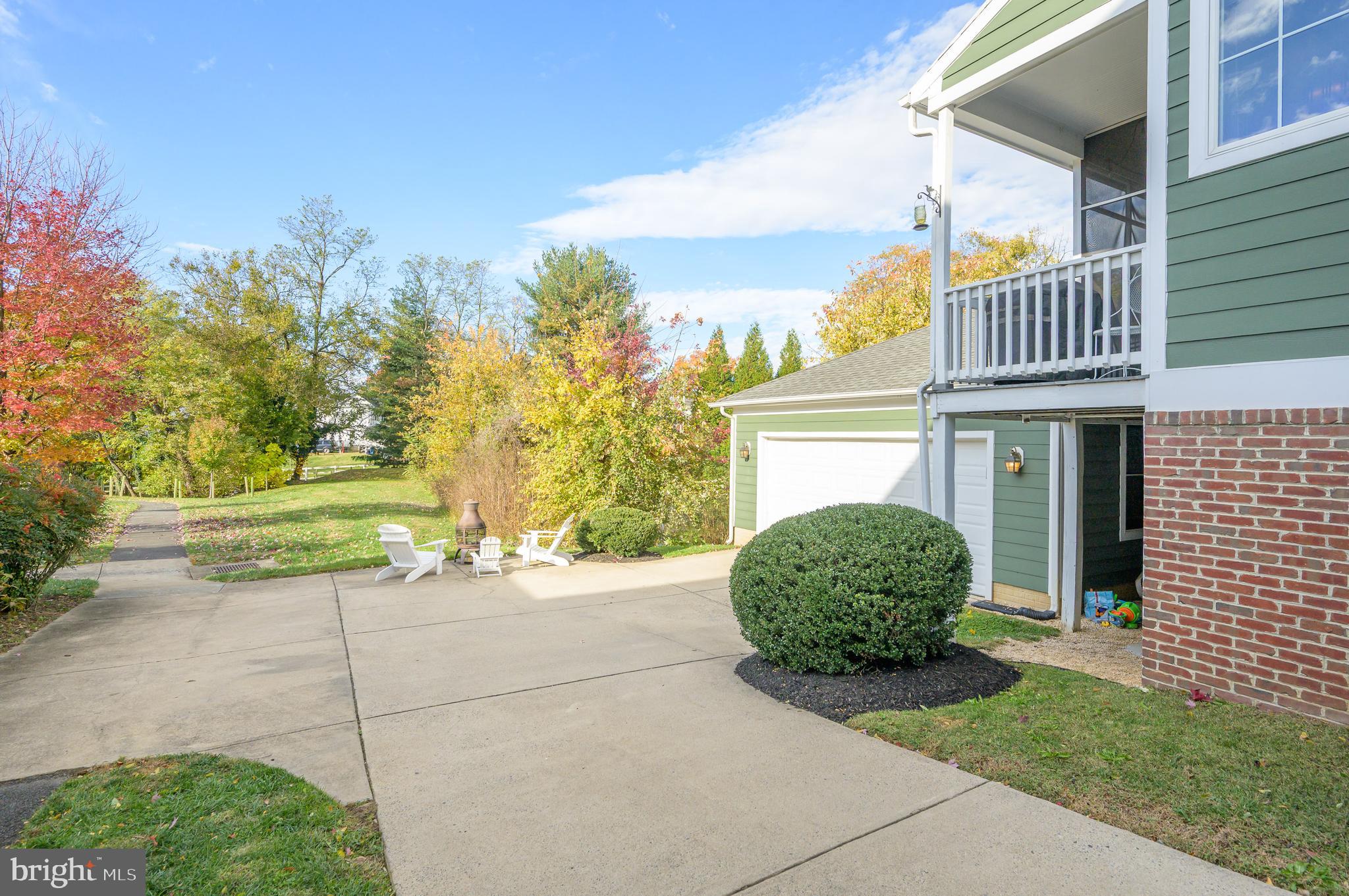109 Amalfi Court Purcellville, VA 20132 - Photo 57 of 65 a house view with a garden space