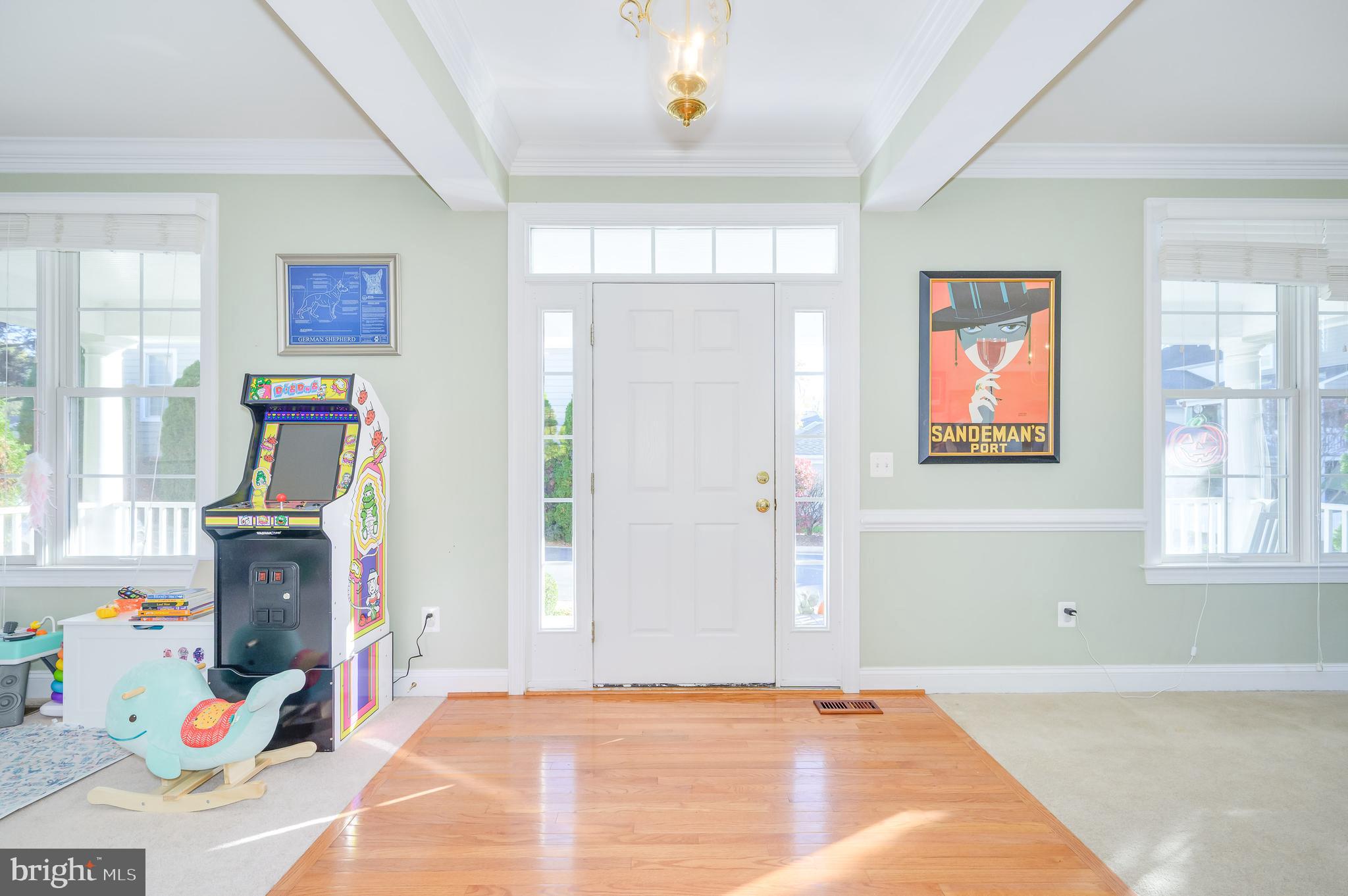 109 Amalfi Court Purcellville, VA 20132 - Photo 8 of 65 a view of an empty room with window and couch