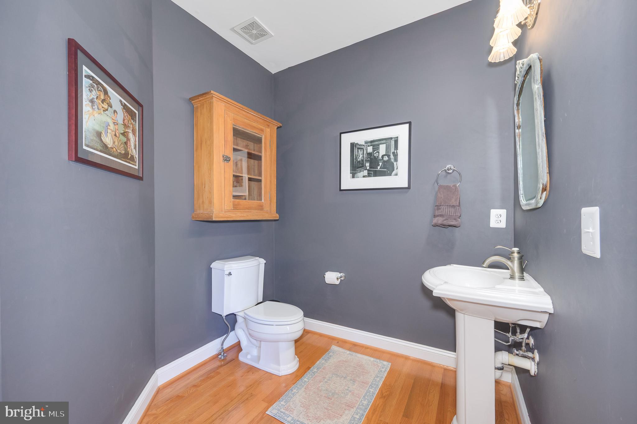 109 Amalfi Court Purcellville, VA 20132 - Photo 10 of 65 a bathroom with a sink toilet and a mirror