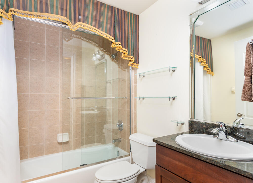 2240 Front Street, Unit 103 Melbourne, FL 32901 - Photo 21 of 37 a bathroom with a sink toilet and shower