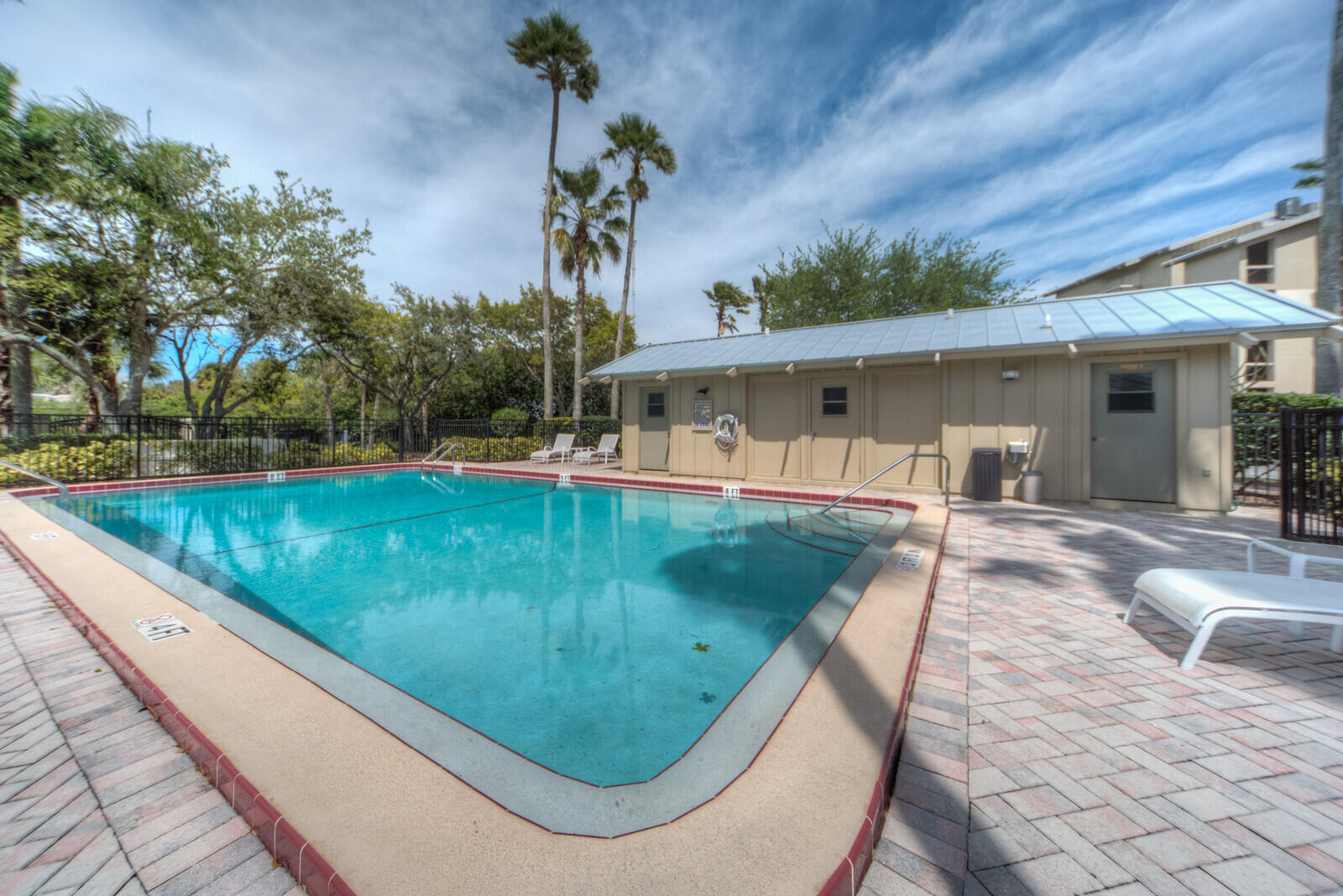 2240 Front Street, Unit 103 Melbourne, FL 32901 - Photo 34 of 37 swimming pool view with a outdoor seating