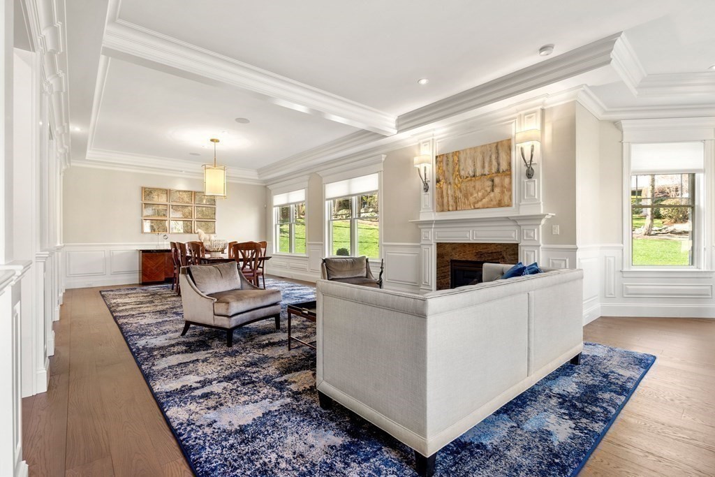 9 Nardell Road Newton, MA 02459 - Photo 11 of 32 a living room with furniture and a fireplace