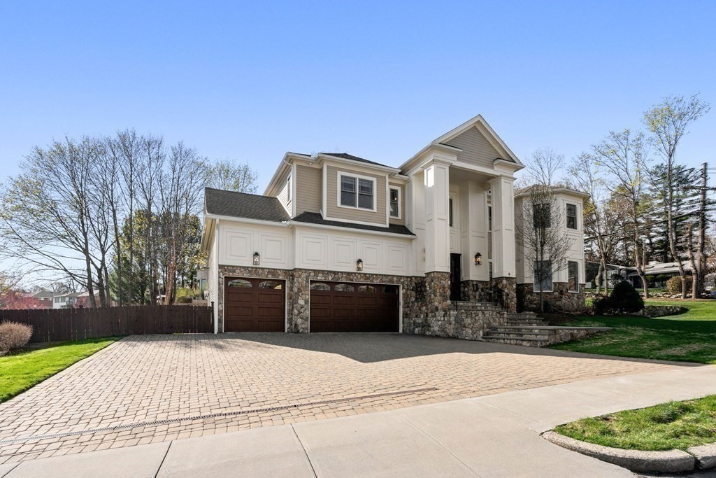 9 Nardell Road Newton, MA 02459 - Photo 30 of 32 a front view of a house with a yard