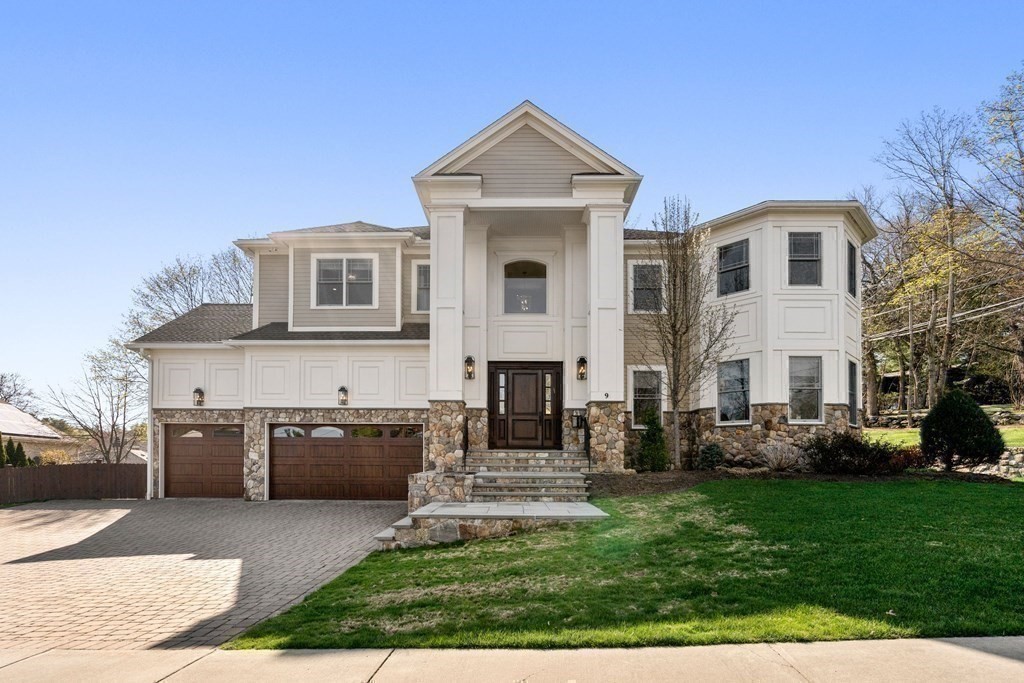 9 Nardell Road Newton, MA 02459 - Photo 31 of 32 a front view of a house with a garden and plants