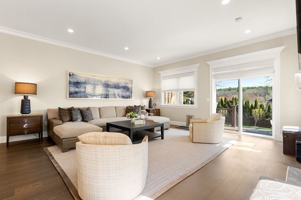 9 Nardell Road Newton, MA 02459 - Photo 8 of 32 a living room with furniture a large window and a potted plant