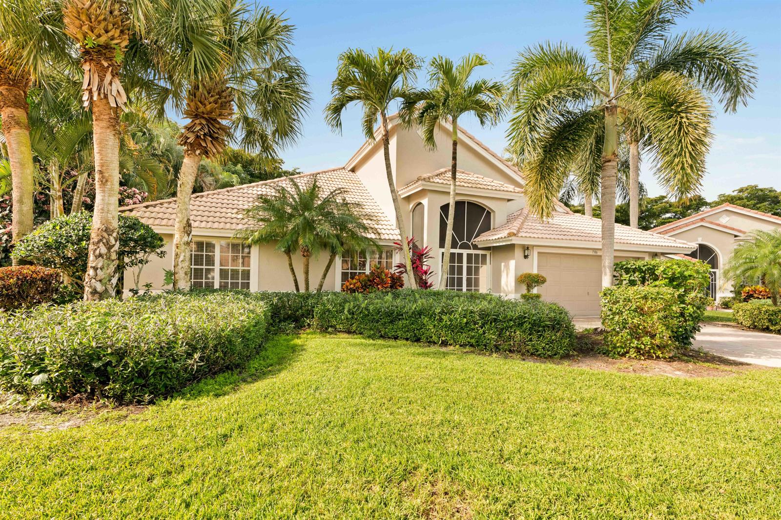 7386 Falls Road East Boynton Beach, FL 33437 - Photo 1 of 32 Front View