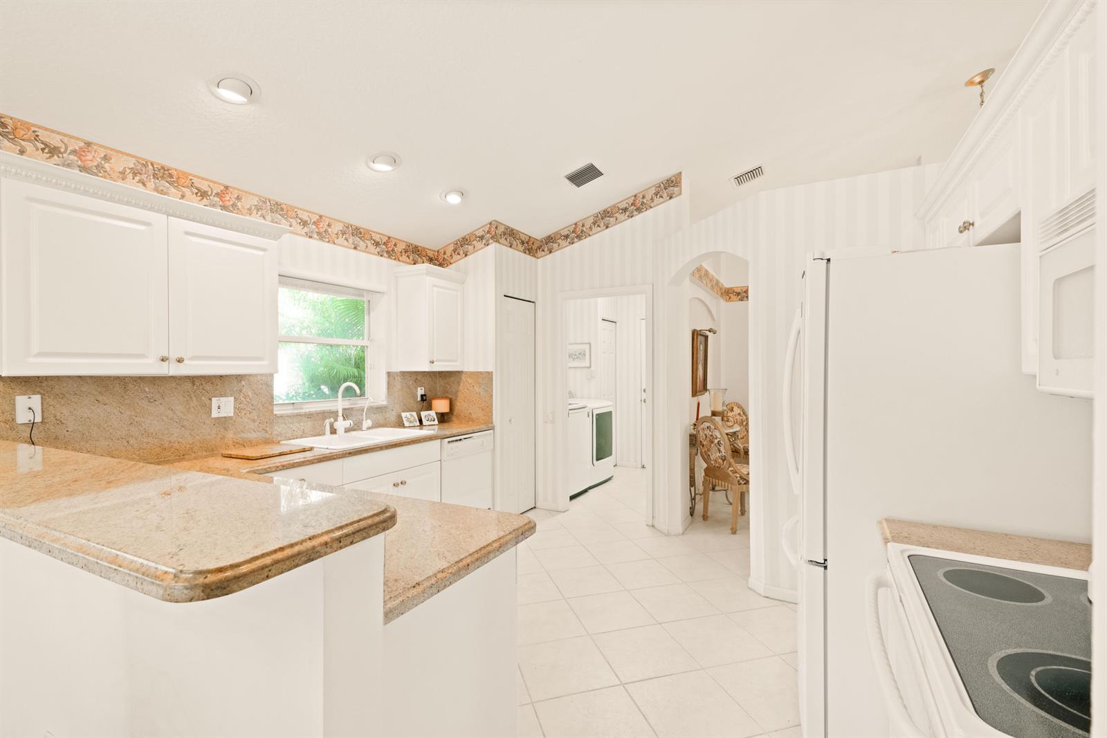 7386 Falls Road East Boynton Beach, FL 33437 - Photo 11 of 32 Kitchen.Snack Bar