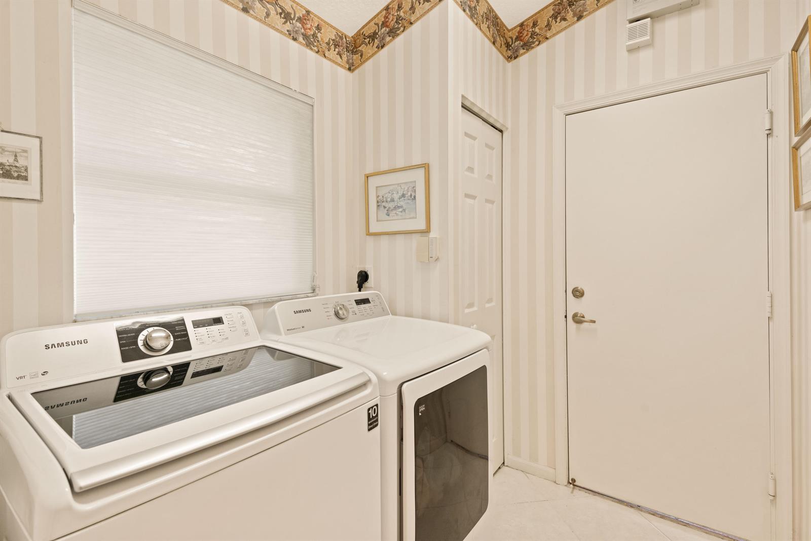 7386 Falls Road East Boynton Beach, FL 33437 - Photo 12 of 32 Laundry to Garage
