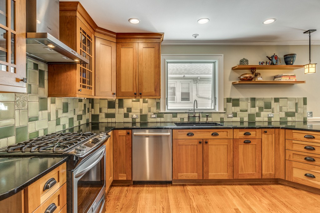 29 Fuller Road, Unit 29 Watertown, MA 02472 - Photo 20 of 29 a kitchen with stainless steel appliances granite countertop a stove and a sink