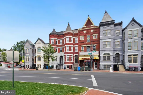 a front view of a multi story residential apartment building