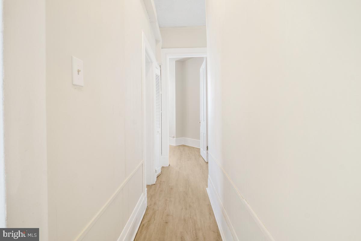 471 Florida Avenue Northwest, Unit 1 Washington, DC 20001 - Photo 24 of 39 a view of a room with wooden floor