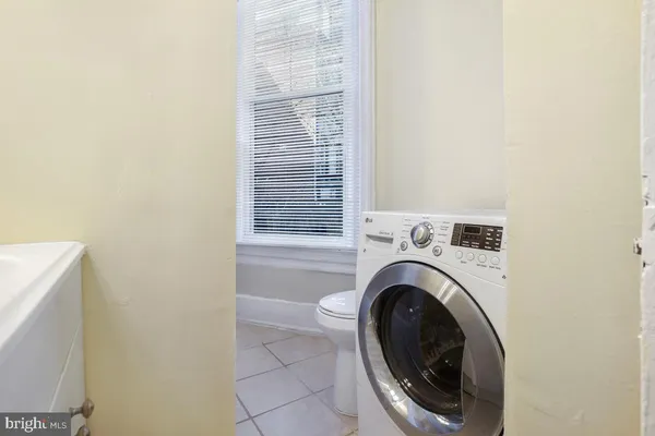 a bathroom with a bath tub
