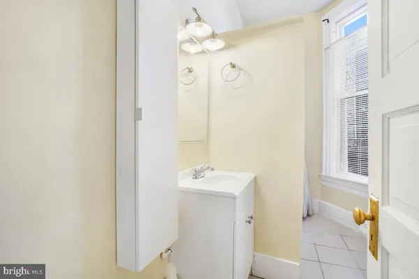 a view of a hallway with washer and dryer